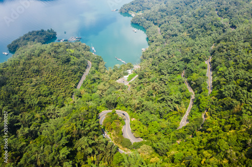 road in forest with a boat at Sun Moon Lake