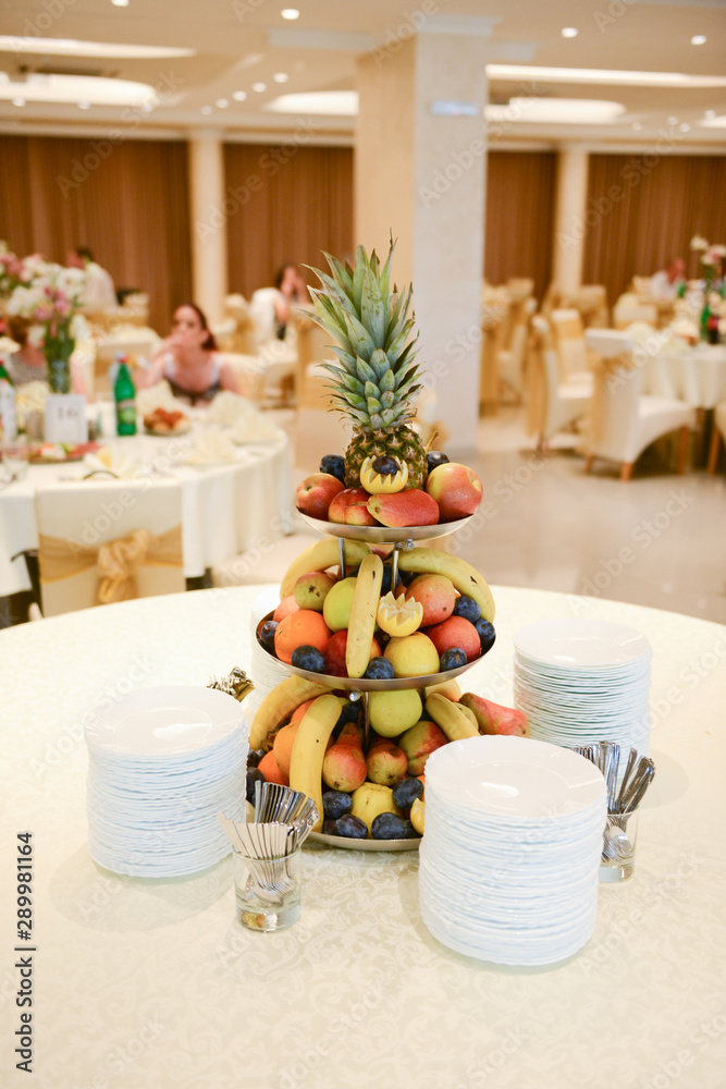 Decorated table full of healthy and fresh fruit
