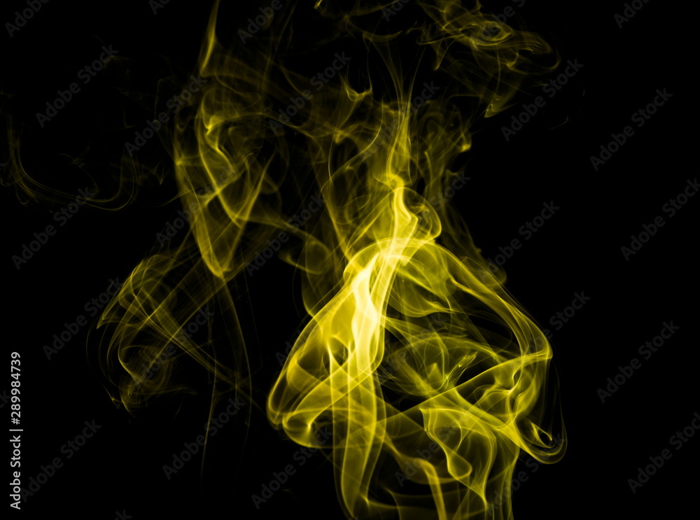Yellow smoke on black background Yellow smoke on black background