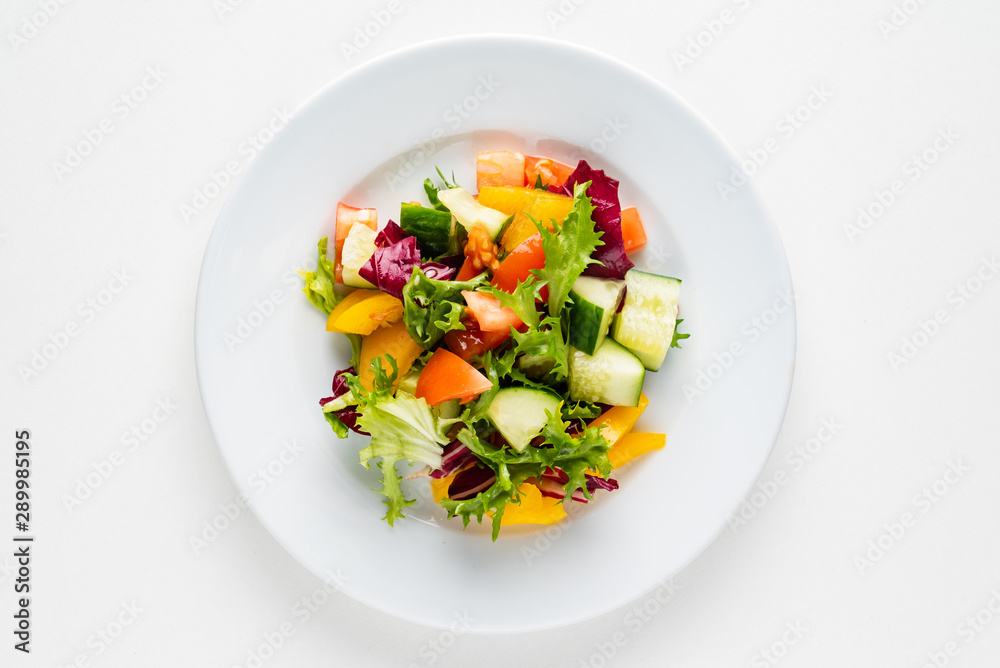 vegetable salad on the white plate