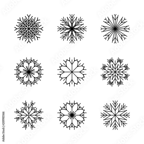  Set of snowflakes on a white background. Snowflakes are made in the traditional New Year style. vector image.