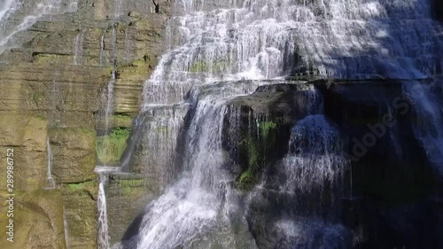 Ithaca Falls large waterfall cascade in Upstate, New York, aerial shot closeup to wide view photo