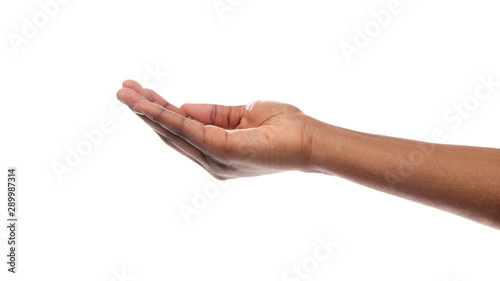 Fotografie Black woman's hand keeping empty cupped palm on white background.
