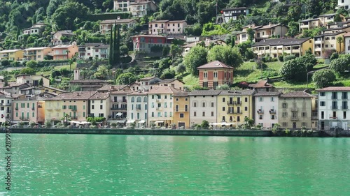 Houses and green landscape on Lake Lugano in Morcote