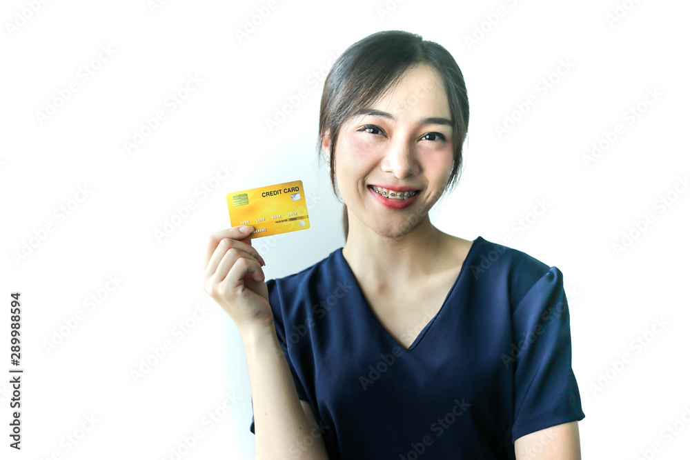 Portrait Asia smiling woman with credit card in hand,happy to have money concept. Portrait Asia smiling woman with credit card in hand,happy to have money concept.