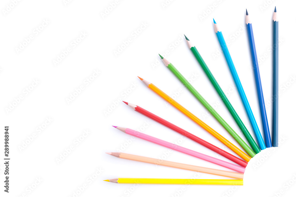 Bright beautiful colored wooden pencils in the shape of the sun or stars in the corner of the picture isolated on a white background