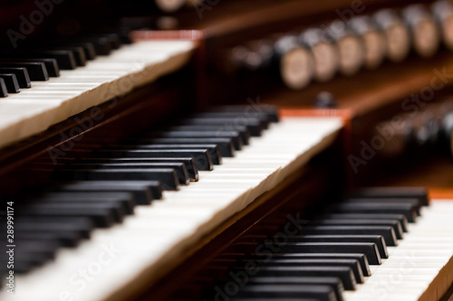 Church organ keyboard in dark colors