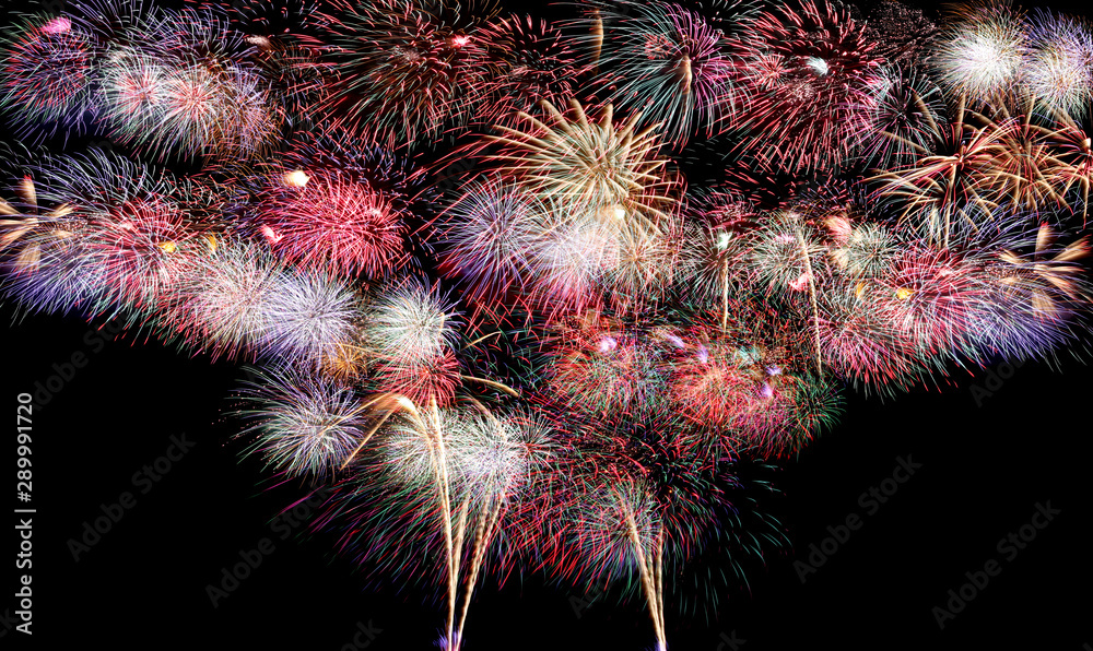 Variety of colors Mix Fireworks or firecracker backdrop.