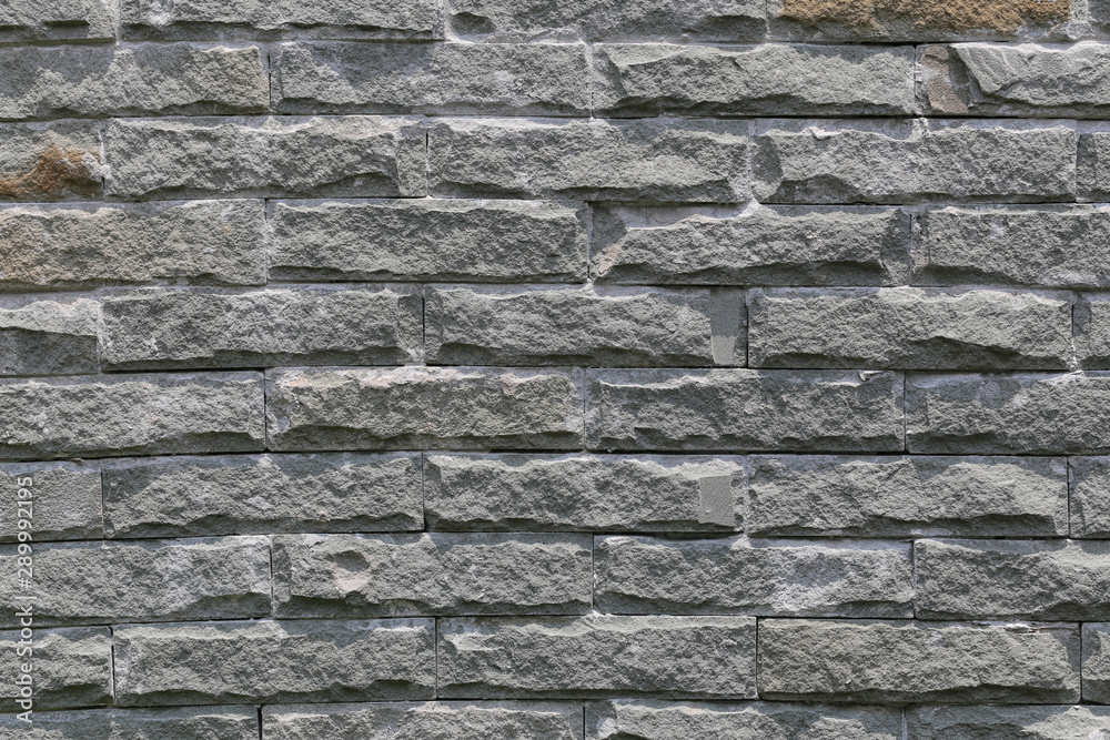 Gray brick wall of the house wall decoration. Gray brick wall of the house wall decoration.