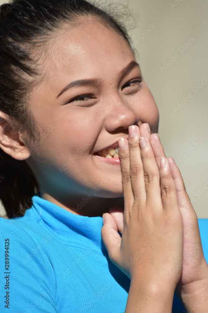 An Attractive Asian Female Praying An Attractive Asian Female Praying