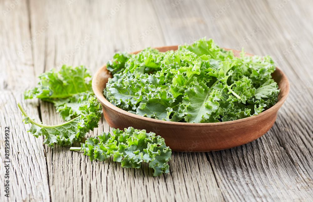 Kale cabbage on wooden background Kale cabbage on wooden background