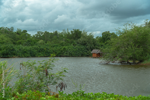 Khlong Bang Phai is a canal that separates the area between Chon Buri Province and Rayong Province.. Also known as one canal two provinces photo