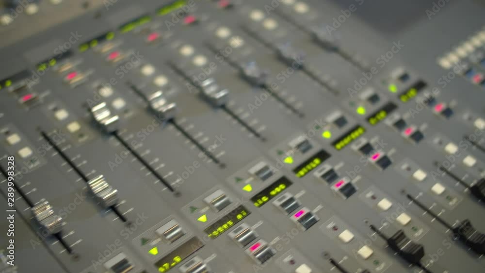 Professional mixing console in the studio, ready to use. Recording studio with professional equipment. Professional mixing console in the studio, ready to use. Recording studio with professional equipment.