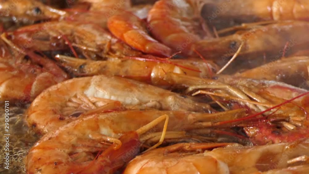 Crowd of King Prawns Cooking in Pan for Traditional Spanish Paella Dish. Crowd of King Prawns Cooking in Pan for Traditional Spanish Paella Dish.