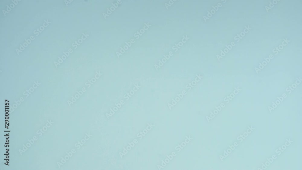 Green Macaroons or macaron on pastel blue surface. Close up. Green Macaroons or macaron on pastel blue surface. Close up.