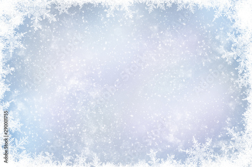 Decorative Christmas background with bokeh lights and snowflakes.