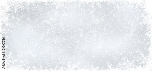 Decorative Christmas background with bokeh lights and snowflakes.