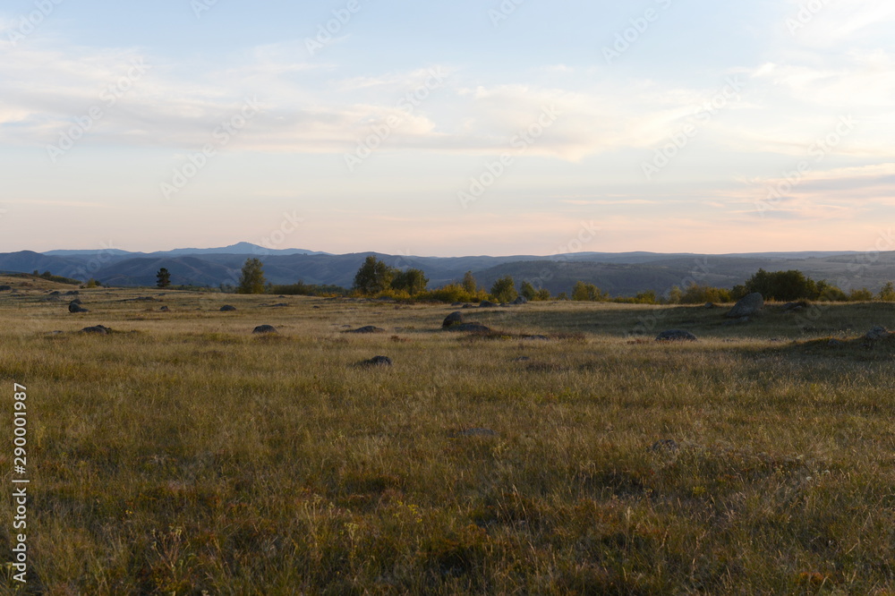 An evening in the Altai mountains near the Charysh River. Western Siberia An evening in the Altai mountains near the Charysh River. Western Siberia