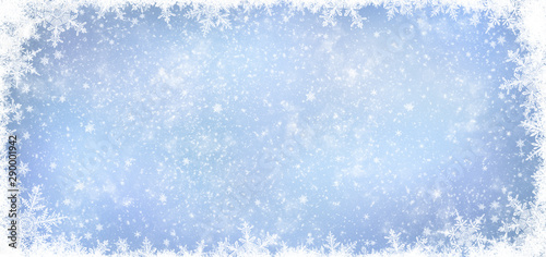 Decorative Christmas background with bokeh lights and snowflakes.