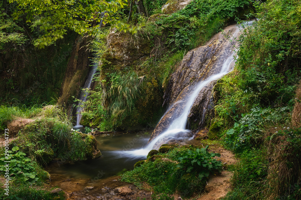 Waterfall in Gostilje village, close up of cascades. Nature outdoors travel destination Gostilje, Zlatibor mountain, Serbia Waterfall in Gostilje village, close up of cascades. Nature outdoors travel destination Gostilje, Zlatibor mountain, Serbia
