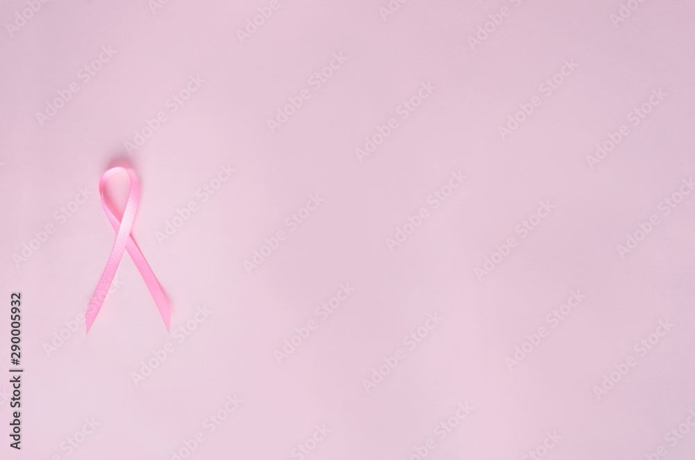 Top view of pink ribbon, symbol of breast cancer.Empty space for text