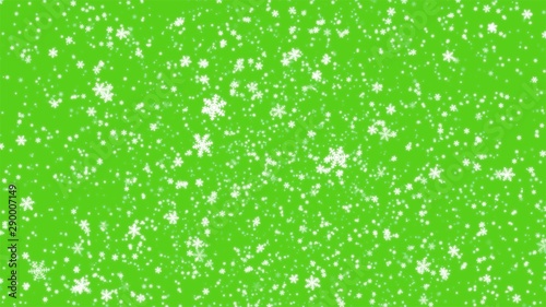 Abstract snowy background with snowflakes, Stardust gold bokeh on green background with flare effect.