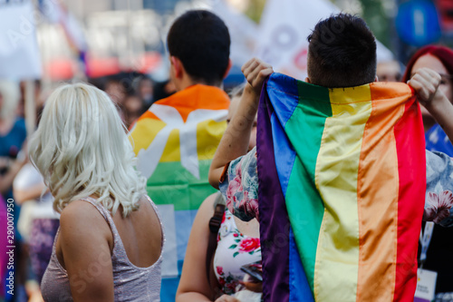 Young people with rainbow flag at Belgrade pride parade