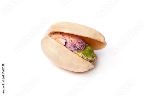 Tasty pistachio nut isolated on white background