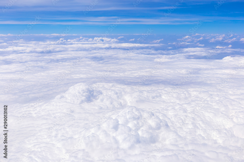 Blue sky background with tiny clouds for graphic design or website template. Blue sky background with tiny clouds for graphic design or website template.