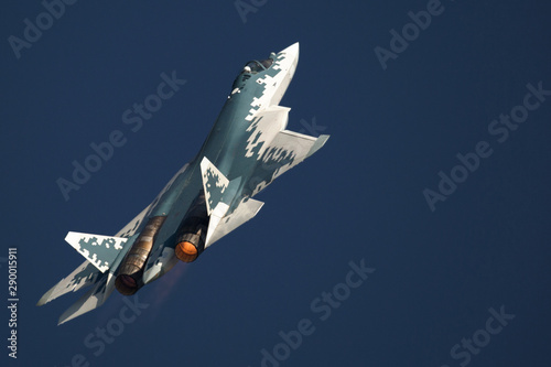 Fotografie Modern jet fighter at the sky