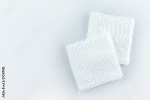 Фототапет gauze pads on white background.
