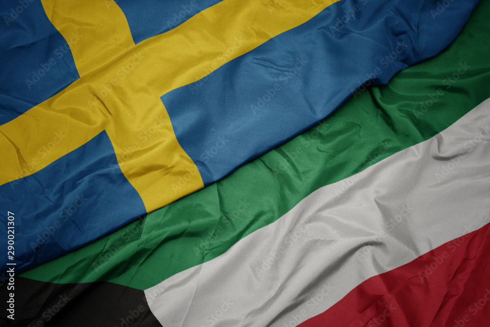 waving colorful flag of kuwait and national flag of sweden. waving colorful flag of kuwait and national flag of sweden.