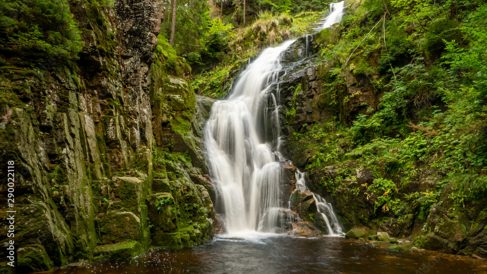 Waterfall in mountains. Famous Kamienczyk waterfall in the Karkonosze National Park in Sudety mountains, Poland
