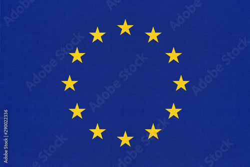 European union official textile blue flag with star. photo