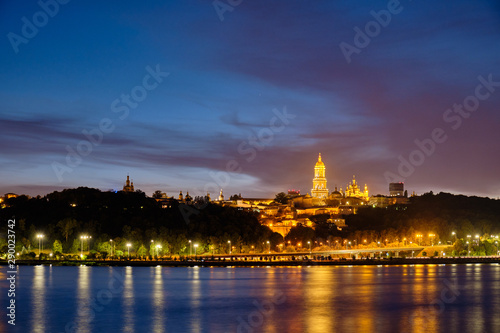 Kyiv Pechersk Lavra and Dnieper River at night in Kyiv.