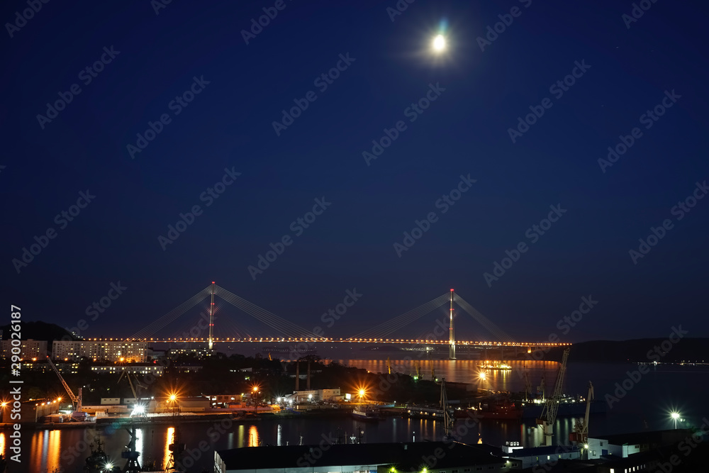 Night landscape with views of the Russian bridge.