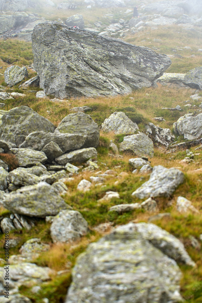 Huge rocks on mountain trail
