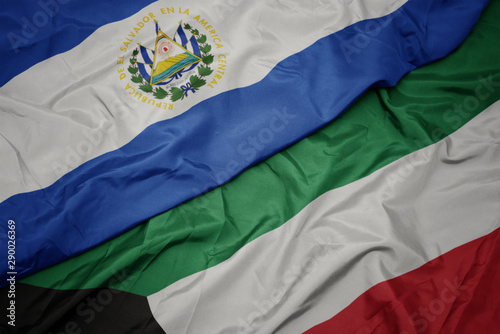 waving colorful flag of kuwait and national flag of el salvador.