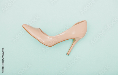 woman legs in shoes on white background