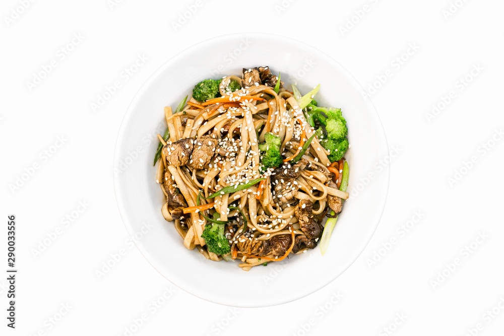 Wok noodles with toppings top view isolated on white background Wok noodles with toppings top view isolated on white background