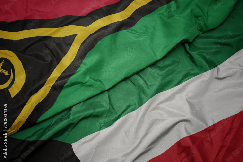 waving colorful flag of kuwait and national flag of Vanuatu .
