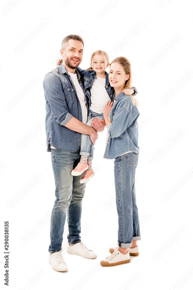 full length view of happy parents in jeans holding daughter isolated on white full length view of happy parents in jeans holding daughter isolated on white