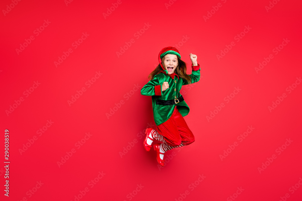 Full length body size view of nice attractive cheerful cheery funny funky overjoyed small little pre-teen elf having fun rejoicing isolated over bright vivid shine red background - obrazy, fototapety, plakaty 