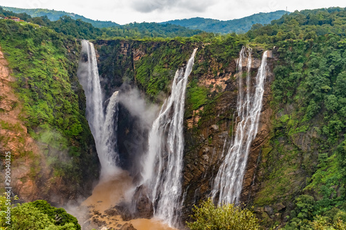 Beautiful view of very famous Jog Falls, Rocket Falls and Roarer Falls on Sharavathi River, in Western Ghats of Karnataka state in monsoon season. Entire South India is famous for such scenic beauty. photo