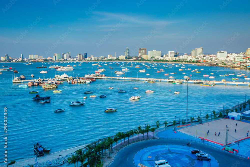PATTAYA, Thailand - March 13 2019 : Pattaya City and text on hill ,Bali Hai Pier.Is an outstanding tourist attraction in Thailand. Many marinas Beautiful sea and blue sky
