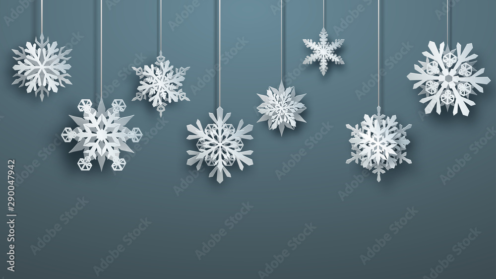 Christmas large complex paper hanging snowflakes on gray background Christmas large complex paper hanging snowflakes on gray background