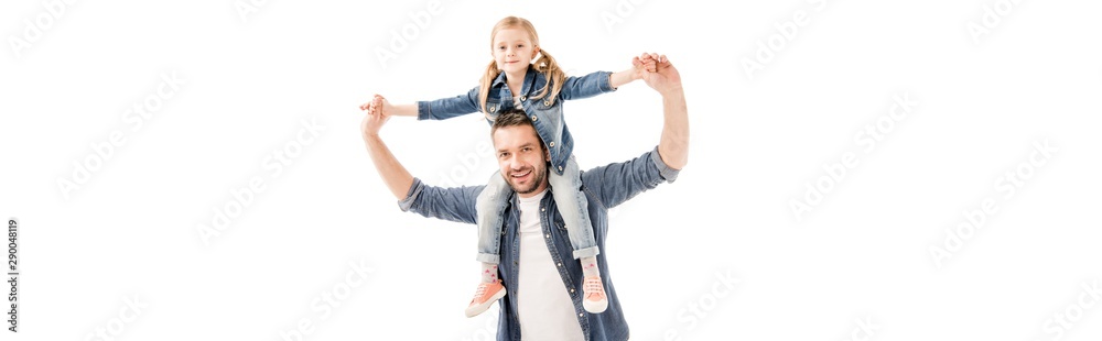 Fototapeta premium panoramic shot of smiling father holding daughter on shoulders isolated on white