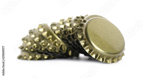New golden bottle cap for beer isolated on white, side view, macro