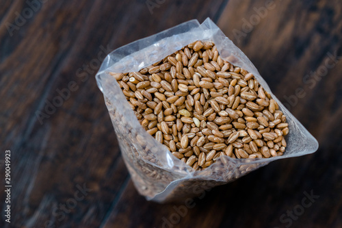 Karakilcik Organic Wheat Grain Seeds in Plastic Package / Container. photo