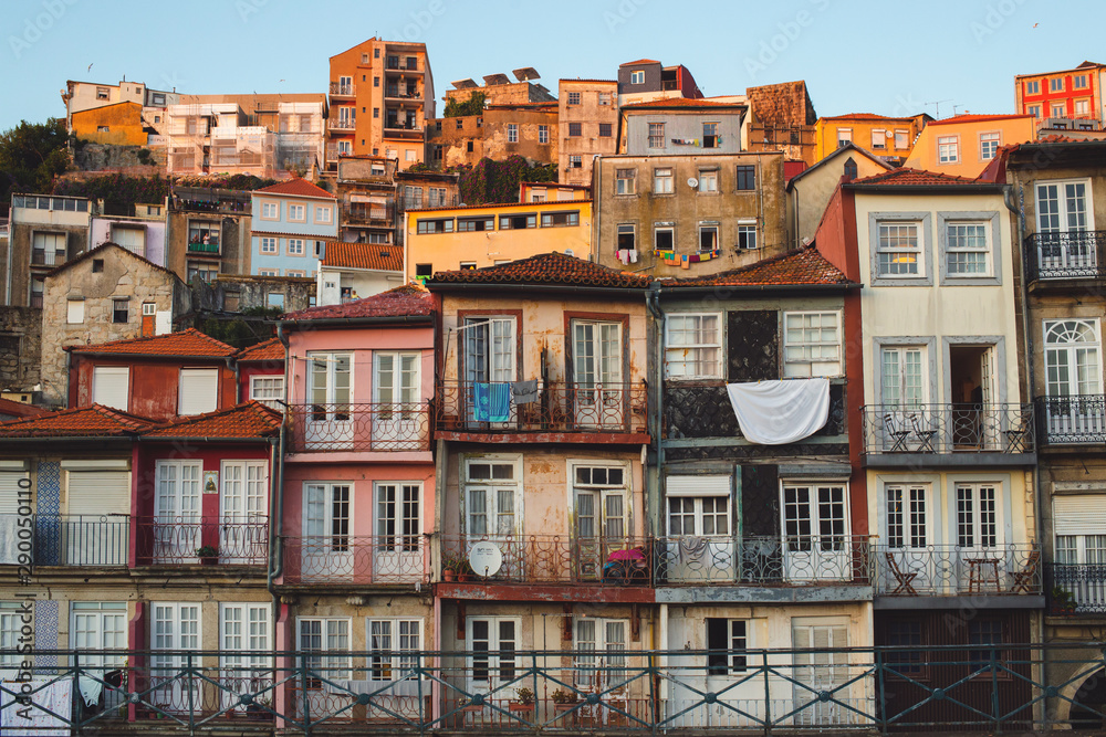 View on old buildings in Porto, Portugal. Sunset in the city.
